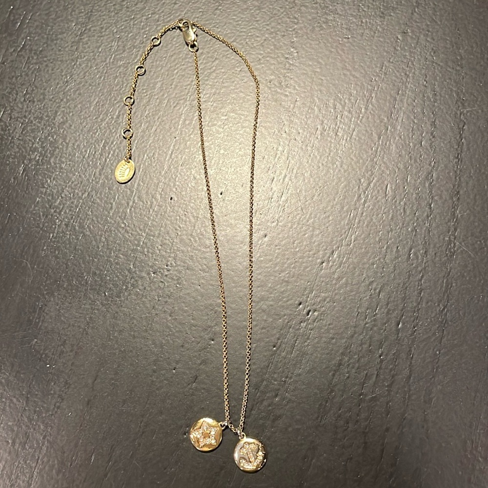 Juicy Couture necklace star and anchor charm this one has a little tarnish